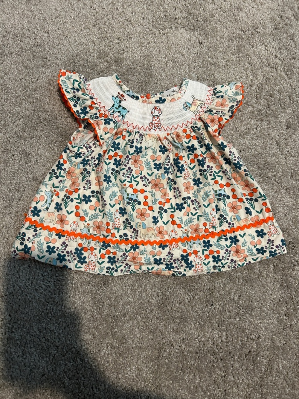 Smocked Floral Flutter-Sleeve Baby Top in Cream and Orange